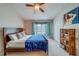 Spacious main bedroom with neutral walls, ceiling fan, large window, and ample closet space at 367 Countryside Key Blvd, Oldsmar, FL 34677