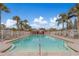 Inviting community swimming pool with lounge chairs and a pool house at 367 Countryside Key Blvd, Oldsmar, FL 34677