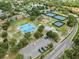 The aerial view shows a neighborhood park with tennis, basketball, and playground facilities at 3721 Casaba Loop, Valrico, FL 33596