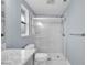 Bathroom featuring a glass-enclosed shower with white tiling, a new toilet, and sleek fixtures at 3721 Casaba Loop, Valrico, FL 33596