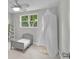 Bedroom featuring a toddler bed with a canopy, neutral colors, ladder and view of the outdoors at 3721 Casaba Loop, Valrico, FL 33596