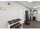Well-equipped gym with weights and punching bag for a full-body workout at 400 64Th Ave # 202, St Pete Beach, FL 33706