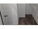 Well-organized walk-in closet with shelving and carpet, offering ample storage space at 4707 Barrett Ct, Tampa, FL 33617