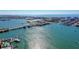 A mesmerizing view of the coastline, showcasing turquoise waters, beaches and residential areas at 4775 Cove Cir # 803, St Petersburg, FL 33708
