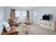 Comfortable living room features modern furniture, a large window, and a serene view at 4775 Cove Cir # 803, St Petersburg, FL 33708