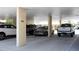 Covered parking area featuring assigned parking spots and secure access at 4775 Cove Cir # 803, St Petersburg, FL 33708