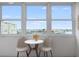 A stunning view from a cozy seating area highlighting waterfront and city skyline at 4775 Cove Cir # 803, St Petersburg, FL 33708