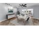 Bright dining room featuring stylish furnishings and seamless flow into the living room at 4849 Floramar Ter, New Port Richey, FL 34652