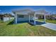Charming single-story home with a covered parking area and well-maintained landscaping at 4849 Floramar Ter, New Port Richey, FL 34652