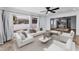 Spacious living room featuring stylish decor, neutral colors, and an open-concept design at 4849 Floramar Ter, New Port Richey, FL 34652