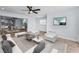 Spacious living room featuring stylish decor, neutral colors, and an open-concept design at 4849 Floramar Ter, New Port Richey, FL 34652