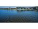 Scenic waterfront featuring calm waters and surrounding properties in a picturesque setting at 4849 Floramar Ter, New Port Richey, FL 34652