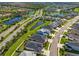 Beautiful aerial view of the neighborhood showcasing the community lakes, and well-maintained landscaping at 4906 Los Robles Ct, Palmetto, FL 34221