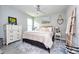 Cozy bedroom with warm textiles, stylish dresser and bedside tables, and calming decor at 4906 Los Robles Ct, Palmetto, FL 34221