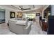Spacious living area featuring tile flooring, modern furnishings, and plenty of natural light at 4906 Los Robles Ct, Palmetto, FL 34221