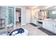 Luxury main bathroom with double sinks, walk-in shower, and abundant vanity space at 4906 Los Robles Ct, Palmetto, FL 34221