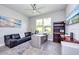 Inviting office featuring contemporary desk, comfortable seating, and natural light at 4906 Los Robles Ct, Palmetto, FL 34221