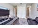 Home office space with large desk, sliding door closet, and a view into the bathroom at 4906 Los Robles Ct, Palmetto, FL 34221