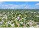 Aerial view of the neighborhood featuring lush trees and charming homes at 5124 3Rd N Ave, St Petersburg, FL 33710