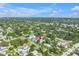 Aerial view of the neighborhood featuring lush trees and charming homes at 5124 3Rd N Ave, St Petersburg, FL 33710