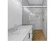 Modern bathroom featuring a glass shower, dual sinks, and a marble countertop at 5124 3Rd N Ave, St Petersburg, FL 33710