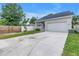 Traditional one-story home with large driveway and manicured lawn at 5124 3Rd N Ave, St Petersburg, FL 33710