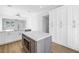 Kitchen features an eat-in island, bright cabinets, and stainless microwave at 5124 3Rd N Ave, St Petersburg, FL 33710