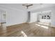 Spacious living room featuring hardwood floors, recessed lighting, and staircase to the second floor at 5124 3Rd N Ave, St Petersburg, FL 33710