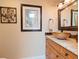 Stylish powder room with modern vessel sink, granite countertops, and custom decor at 6207 Ridge Top Dr, New Port Richey, FL 34655