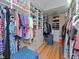 Spacious walk-in closet with ample shelving and storage for clothes, shoes, and accessories at 6207 Ridge Top Dr, New Port Richey, FL 34655