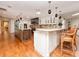 Expansive kitchen with custom cabinets, granite countertops, dual islands, and modern appliances, ideal for culinary enthusiasts at 6207 Ridge Top Dr, New Port Richey, FL 34655
