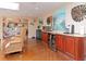 Living area with wine cooler and art, open to other parts of the house at 6207 Ridge Top Dr, New Port Richey, FL 34655