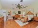 Inviting primary suite featuring hardwood floors and adjacent ensuite bathroom at 6207 Ridge Top Dr, New Port Richey, FL 34655