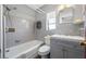 Bathroom featuring gray tiling in the shower and updated vanity sink at 6219 Hampton N Dr, St Petersburg, FL 33710