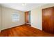 Bedroom with closet and wood floors, perfect for relaxation and rest at 6219 Hampton N Dr, St Petersburg, FL 33710