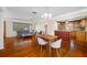 Open-concept layout seamlessly connects the dining area, living room, and kitchen at 6219 Hampton N Dr, St Petersburg, FL 33710