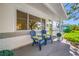 Inviting front porch features comfortable seating and manicured greenery at 6219 Hampton N Dr, St Petersburg, FL 33710