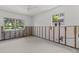 Renovation-ready bedroom with exposed framing and windows showcasing the property's outdoor view at 6301 13Th N Ave, St Petersburg, FL 33710