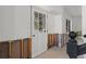 Entryway featuring a view of a traditional door, with exposed interior framing and staircase access at 6301 13Th N Ave, St Petersburg, FL 33710