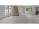 Bright living room with double doors and natural light streaming through the window at 6301 13Th N Ave, St Petersburg, FL 33710