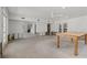 Expansive living room with ceiling fan, ready for renovation and design at 6301 13Th N Ave, St Petersburg, FL 33710