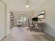 Inviting office space with a cozy atmosphere, featuring a desk and an accent chair with natural lighting at 6301 13Th N Ave, St Petersburg, FL 33710