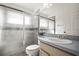 Bathroom featuring a shower, sink, and toilet at 6318 Ashfield Pl, Wesley Chapel, FL 33545