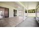 Large covered patio with access to the backyard, ideal for outdoor entertaining at 6318 Ashfield Pl, Wesley Chapel, FL 33545