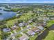 Aerial view of real estate, golf course, and waterways at 6780 Greenbrier Dr, Seminole, FL 33777