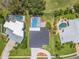An overhead view of homes and their enclosed pools at 6780 Greenbrier Dr, Seminole, FL 33777