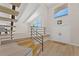 Bright foyer with wood floors, staircase and vaulted ceilings, offering a grand entrance at 6780 Greenbrier Dr, Seminole, FL 33777