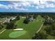 Scenic aerial view of the meticulously maintained golf course at 6780 Greenbrier Dr, Seminole, FL 33777