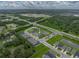 Aerial view of a new home community with multiple ponds, and easy access to roadways at 8119 Trimbelle Ter, Parrish, FL 34219