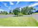 Expansive, well-maintained backyard featuring lush greenery and a sturdy privacy fence at 828 Terra Vista St, Brandon, FL 33511
